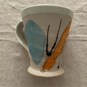 Handcrafted Ceramic Mug with Blue and Cream Accents